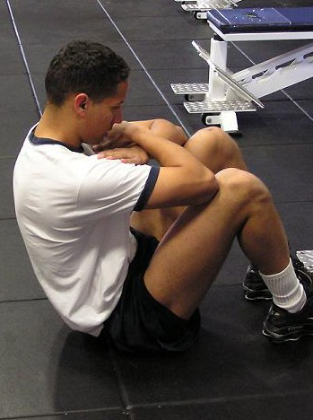 Student doing crunches