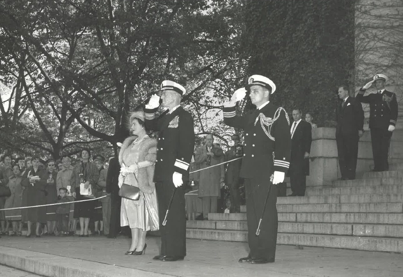 Rear Admiral Boon officially receives Queen Elizabeth, the Queen Mother.