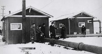 Michelson’s colleagues and assistants at the velocity of light experiment site in Clearing, Illinois, in the winter of 1924. [1109K]