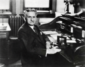 Michelson seated at his desk in the Rhyerson Physical laboratory about 1927