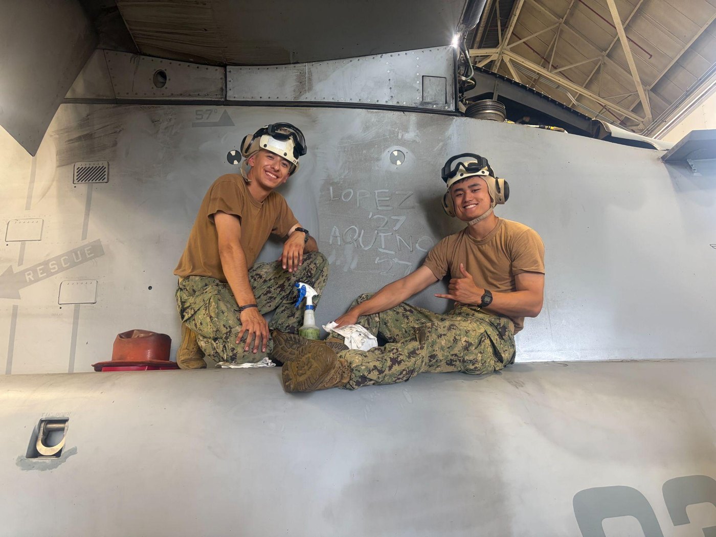 Midshipmen work with fleet Marines on aviation maintenance during MAGTF