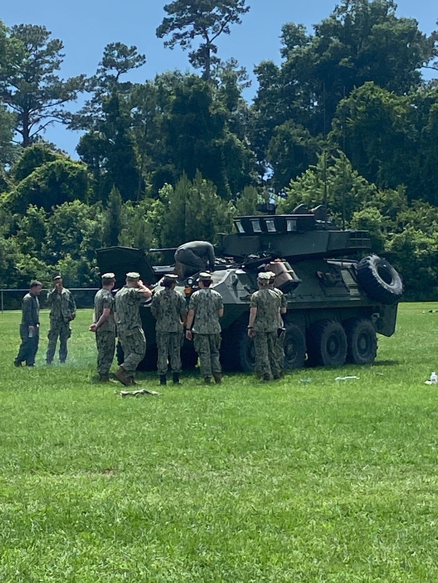 Midshipmen explore a light armored vehicle during PROTRAMID